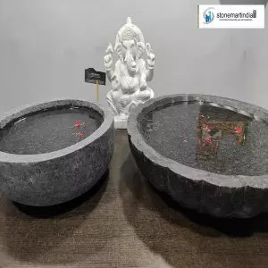Granite Bowls, Urli And White Marble Ganesha Statue