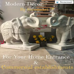 Sold To A Reputed Jewellery Store In Hyderabad, Telangana - White Marble Stone Elephant Statue Pair With Trunk Up For Outdoor