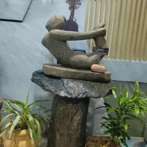 Bali Stone Sculpture In Dhanurasan