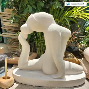 Stone Sculpture In Yoga Pose