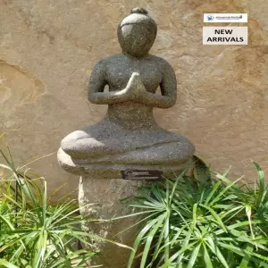 Stone Statue In Folding Hands Yoga Pose